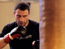 Vitali Klitschko works the bag during a training session