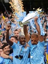  Vincent Kompany and Yaya Toure celebrate with the Premier League trophy