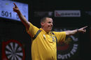 Dave Chisnall celebrates victory over Simon Whitlock at the Dubai Duty Free Masters
