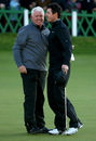 Rory McIlroy and dad Gerry share a hug on the 18th