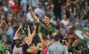 Sam Burgess is held aloft as the Rabbitohs win the NRL final