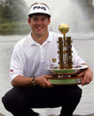 Lee Westwood shows off his trophy