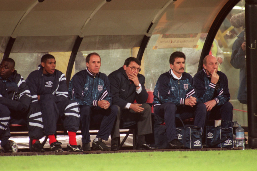 Graham Taylor ponders as the England bench looks on during the World Cup qualifier match between San Marino and England