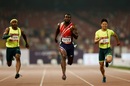 Justin Gatlin races ahead in Beijing
