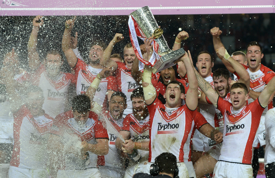 Captain Paul Wellens lifts the trophy after St Helens win the Grand Final