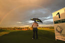 A rainbow forms as heavy rain disrupts the Portugal Masters