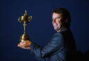 Paul Azinger poses with the Ryder Cup after his USA team's victory