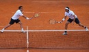 Daniele Bracciali and Potito Starace in doubles action