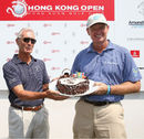 Ernie Els is presented with a birthday cake after shooting a 65 to lead at the Hong Kong Open