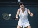 Billie Jean King plays a forehand