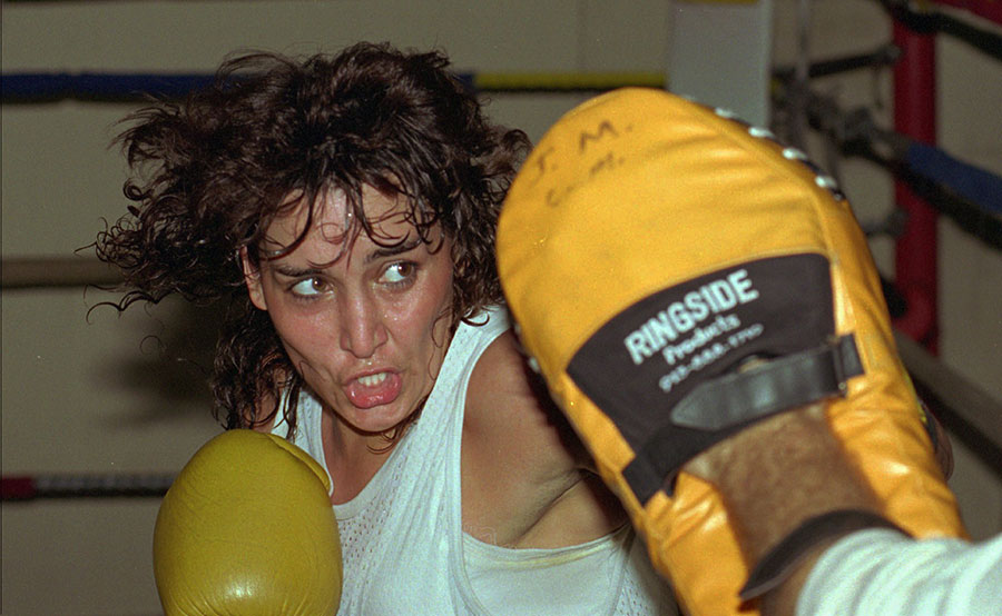 Female boxer Christy Martin in training