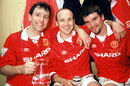 Manchester United trio Bryan Robson, Mike Phelan and Roy Keane celebrate winning the Premiership title