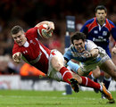 Wales' Scott Williams is tackled by Argentina's Gonzalo Tiesi