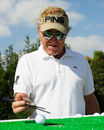 Miguel Angel Jimenez takes part in the traditional chopstick challenge ahead of the BMW Masters