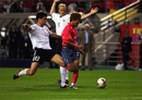 Michael Ballack picked up a booking after bringing down Lee Chun-soo