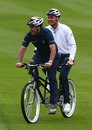 Paul McGinley and Justin Rose ride a tandem prior to the BMW Masters