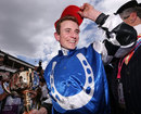 Jockey Ryan Moore celebrates after winning the Melbourne Cup on Protectionist