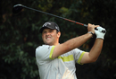 Patrick Reed hits his tee on the fifth