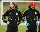 Pepe Reina and Fernando Torres strike a similar pose
