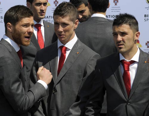 Xabi Alonso, Fernando Torres and David Villa share a joke