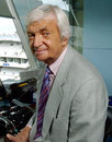 Channel 4 cricket presenter Richie Benaud in the television commentary box