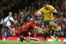 Israel Folau escapes Alex Cuthbert's grasp for his first try