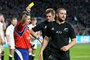 Nigel Owens issues a yellow card to New Zealand's Dane Coles