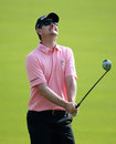 Justin Rose reacts to hitting his drive into the water on the 18th hole in the second round of the Tour Championship