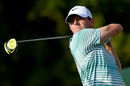 Rory McIlroy watches his drive