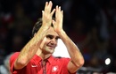 Roger Federer celebrates after defeating Richard Gasque