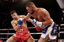 Nathan Cleverly swerves past another hook from Tony Bellew