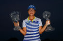 Lydia Ko shows off her LPGA Tour Championship and Race for the Globe trophies