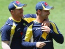 David Warner and Phillip Hughes during a training session at the Gabba