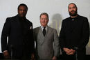 Dereck Chisora and Tyson Fury pose either side of promoter Frank Warren ahead of their rematch