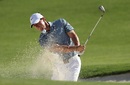 Rory McIlroy plays out of a bunker