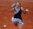 Maria Sharapova leans into a forehand