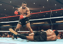 Mike Tyson floors heavyweight champion Trevor Berbick to become the youngest heavyweight world champion in history