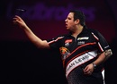 Adrian Lewis throws for the board