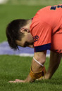 Lionel Messi takes a moment against Valencia