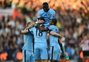 Frank Lampard is mobbed by his Manchester City team-mates