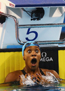 Alia Atkinson reacts after winning the 100m breaststroke final