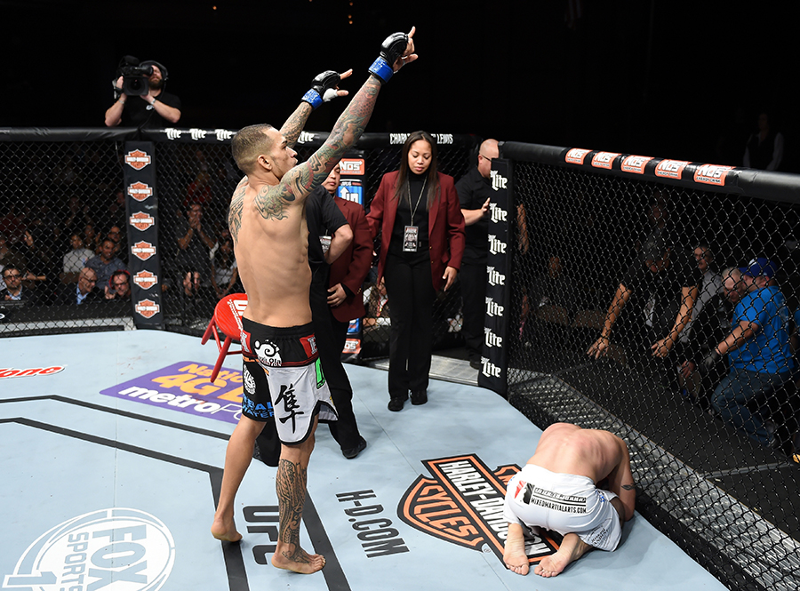 Yancy Medeiros celebrates his submission victory over Joe Proctor