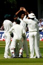 Shahadat Hossain celebrates taking a wicket with his team-mates