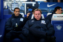QPR manager Harry Redknapp takes his seat before the game