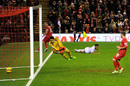Alberto Moreno slots in Liverpool's first goal
