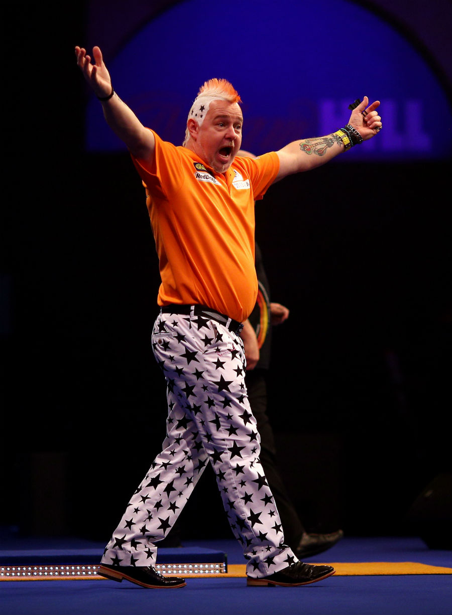Peter Wright celebrates moving into the quarter-finals of the PDC World Championship