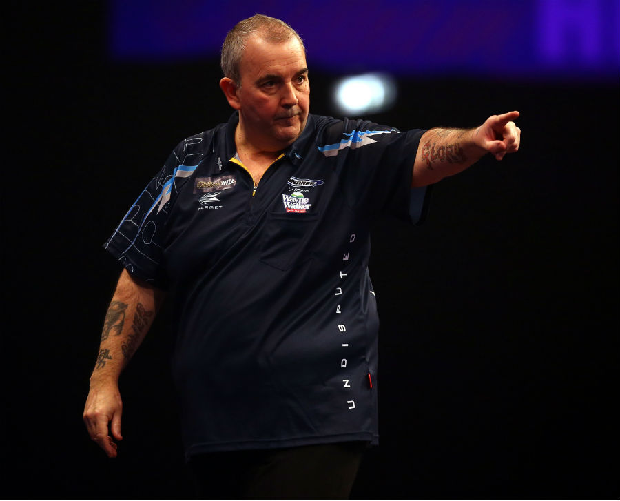 Phil Taylor was made to work for his quarter-final place at the PDC World Championship