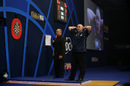 Phil Taylor holds his head after missing three darts at double 12