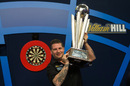 Gary Anderson lifts the Sid Waddell trophy