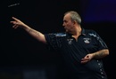 Phil Taylor throws at the board